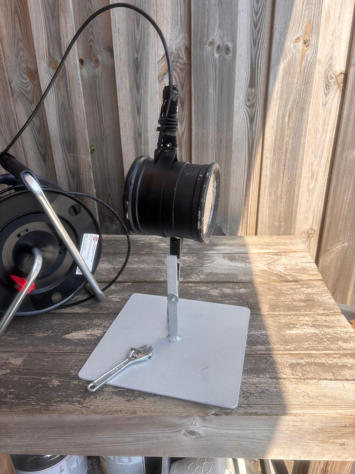 Camera housing mounted to the plate